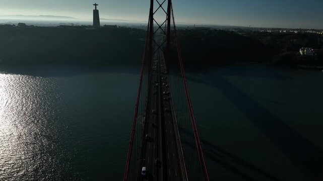 25 de Abril Bridge Cinematic Drone Footage Above the Tagus River in Summer. Lisbon Portugal