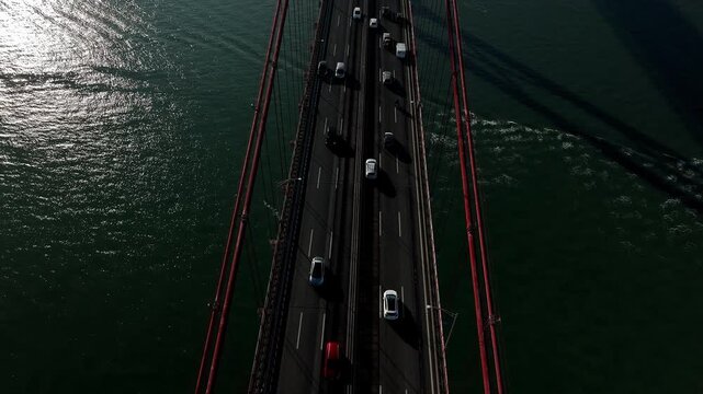 25 de Abril Bridge Cinematic Drone Footage Above the Tagus River in Summer. Lisbon Portugal