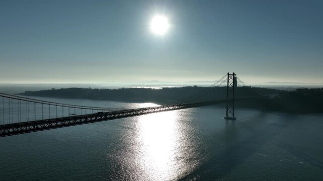25 de Abril Bridge Cinematic Drone Footage Above the Tagus River in Summer. Lisbon Portugal