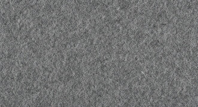 Close-up view of gray felt fabric texture with soft fibrous surface and woven textile pattern