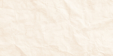 Fototapeta premium Crumpled beige paper texture background with wrinkles and creases