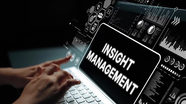 Hands Typing on Laptop with Data Visualization and Insight Management Concept in Dark Theme Background. Asymptotic smart data analytic.