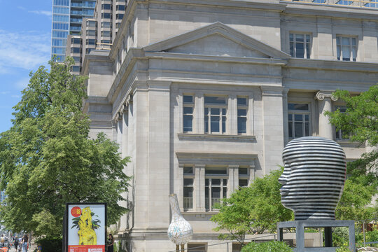 sculpture and sign outside the Gardiner Museum located at 111 Queen's Park (looking north to south elevation of the Lillian Massey Building), Toronto