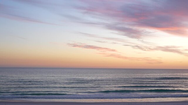 Sunset on Florida Beach. USA Panhandle No People. Colorful Sky Wide Shot Calm Ocean. White Sand. Peaceful Tranquil Landscape Nature.