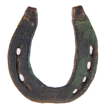 An old rusty horseshoe isolated on a white background.
