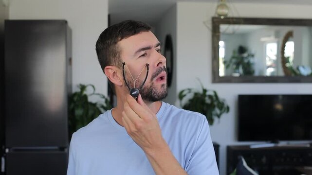 Man using "Threading" as a method for hair removal 