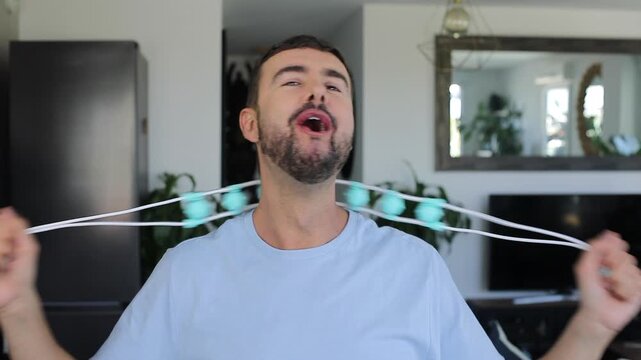 Man using a neck massager
