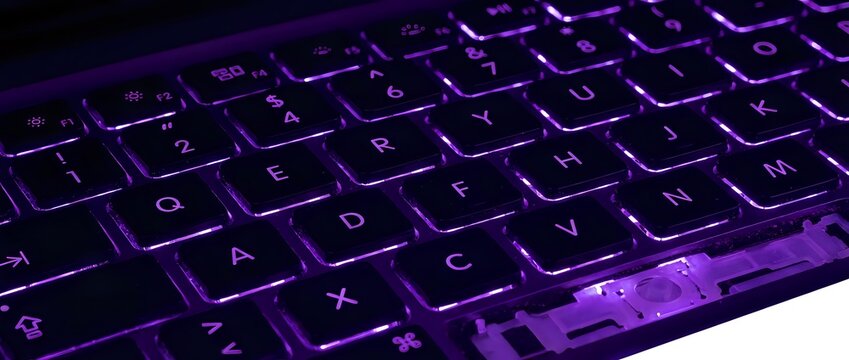 Illuminated gaming keyboard with purple backlit keys on white background, isolated for tech product design and digital marketing use.