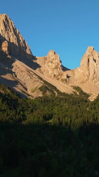 Aerial view of La Jarjatte Valley and Devoluy Massif. Mountain peaks and forest. Drome, French Alps, France