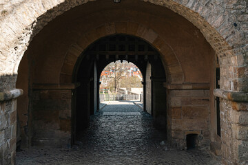 Fototapeta premium Erfurt, Germany - March 27, 2026. Historic Arched Passage in Petersberg Citadel