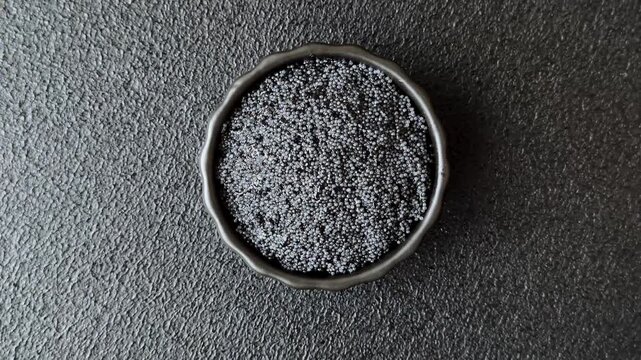 Black caviar from beluga or sturgeon, an expensive delicacy for sandwiches. Black caviar as a food background for your design