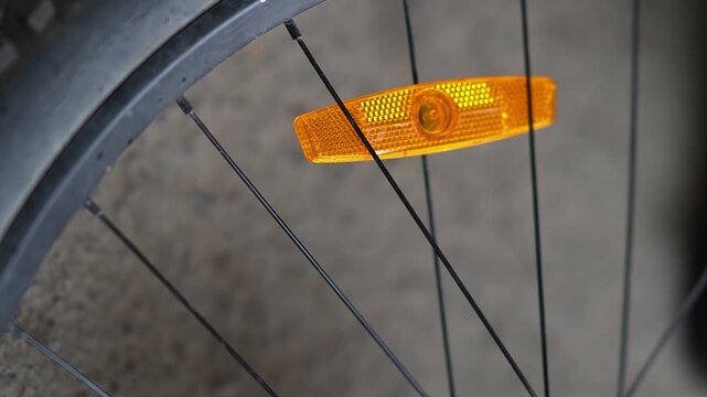 Bicycle wheel light reflector installation. Preparing your bike for the season. Updating parts, riding safety. Installing reflectors on wheels
