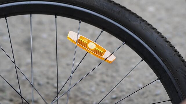 Bicycle wheel light reflector installation. Preparing your bike for the season. Updating parts, riding safety. Installing reflectors on wheels