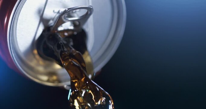 Amazing slow motion of soda pouring from a can in high definition