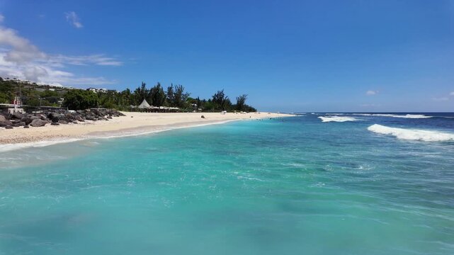 Scenic tropical footage landscape of Saint Gilles Les Bains beach, Reunion Island, Africa	