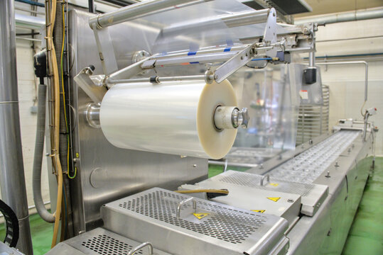 Industrial Automated Thermoforming Packaging Machine on Production Line