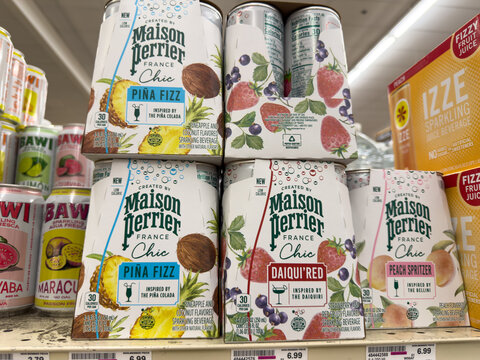 Maison Perrier Chic Sparkling Water Cans On Shelf