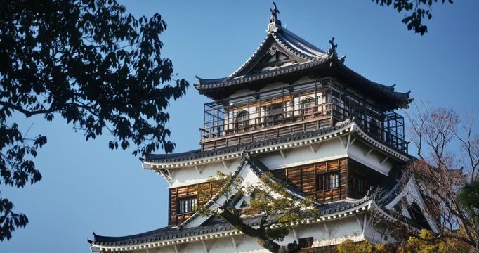 Hiroshima Castle Multi-Tiered Keep Against Clear Blue Sky In Japan - Low, Medium Angle