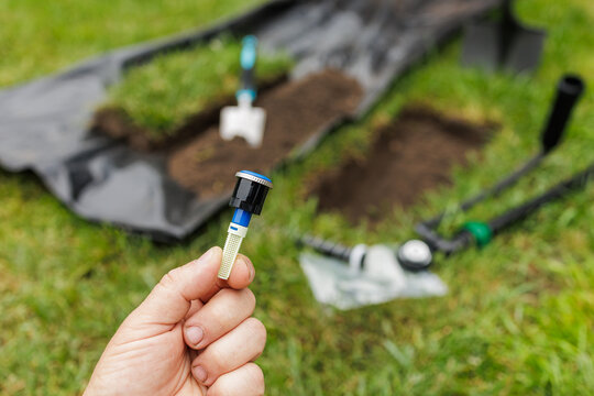 Automatic Lawn Watering System Installation with Sprinkler Nozzle