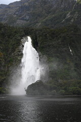 Obraz premium Milford Sound after rain with waterfalls