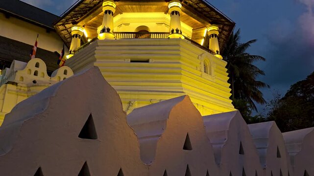 Sri Dalada Maligawa illuminated at evening, Temple of the Sacred Tooth Relic, Kandy, Sri Lanka.