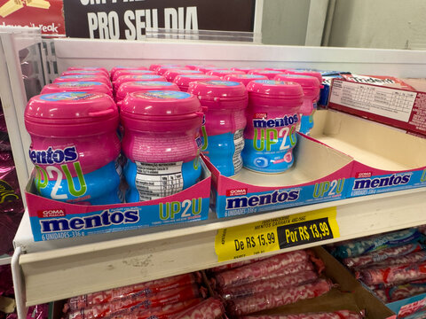 Mentos Up2U candy packs on retail store shelf with price tag