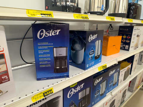 Oster coffee maker products displayed on retail shelf