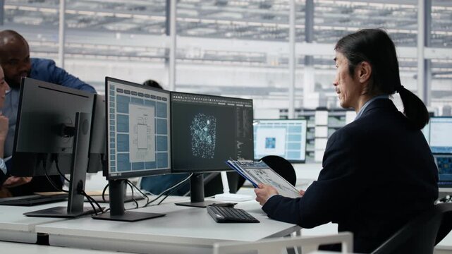 Optimizing microchip production, neural network AI model and hardware developers in factory workspace.