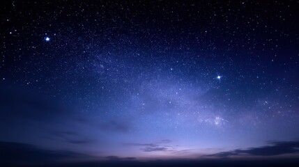 Fototapeta premium Vast Celestial Expanse: Countless Stars Glitter in the Deep Blue Night Sky