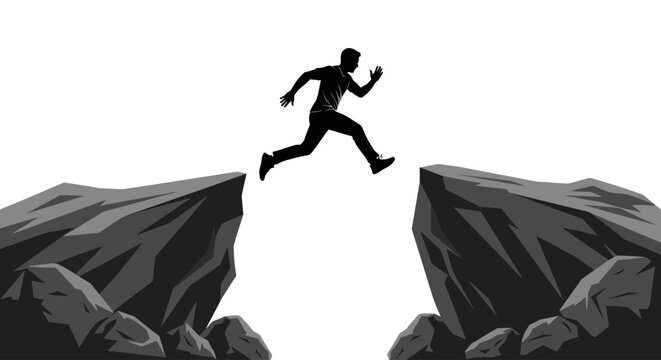 Man jumping across a wide rocky gap representing a challenge overcoming obstacles and achieving success through determination and risk