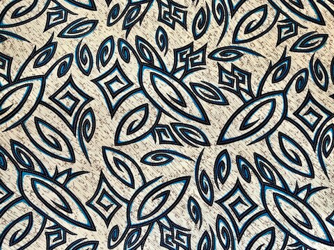 Traditional Indonesian Batik Fabric Pattern with Abstract Geometric and Leaf Motifs