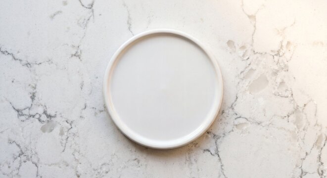 Blank white round ceramic coaster mockup on luxury quartz marble countertop