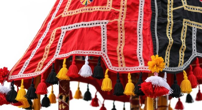 Traditional indian decorative umbrella with colorful tassels