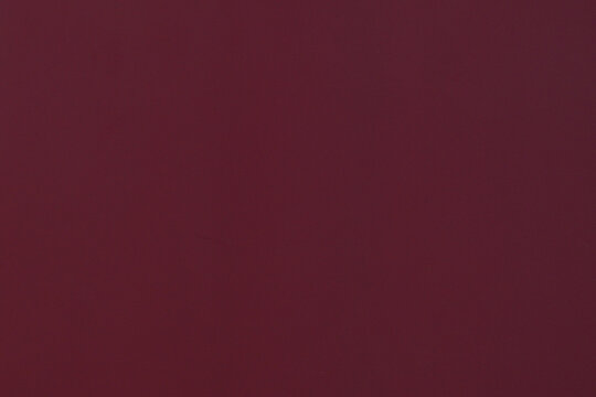 Deep red solid color background for various design purposes