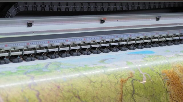 Industrial wide format printer produces high quality topographic map using uv inkjet technology.