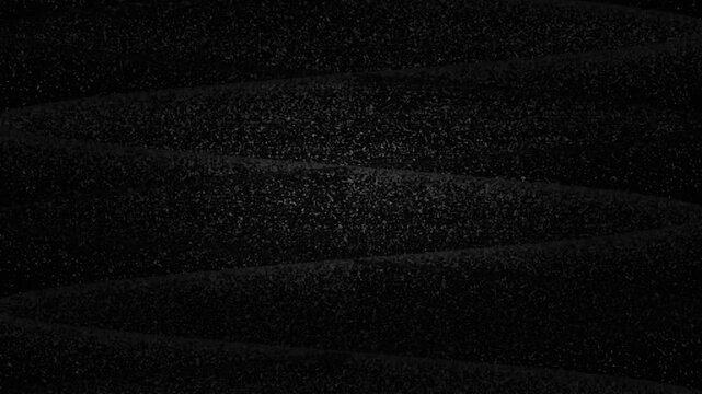 Abstract black liquid waves with grainy monochromatic highlights. 4K Video
