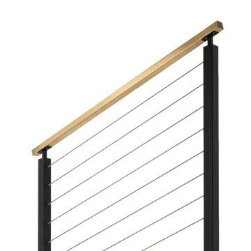 Modern stair railing segment featuring a brushed brass handrail with matte black square posts and horizontal steel cable balusters in a sophisticated design