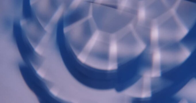 Blur art flare. Glow light. Defocused blue white color lens kaleidoscope illuminated flicker leaking on abstract creative optical background.