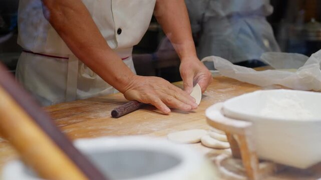 Chef Hands Rolling Dough Pastry Wrapper Flour Wooden Counter Commercial Kitchen Food View
