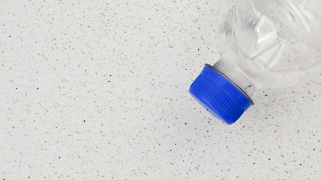 Recyclable plastic bottle, symbol of sustainability and care for the environment. Recyclable plastic bottle detail, an ecological choice to reduce environmental impact.