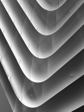 Blue concentric square layers forming optical tunnel of depth, soft gradient lighting and textured.