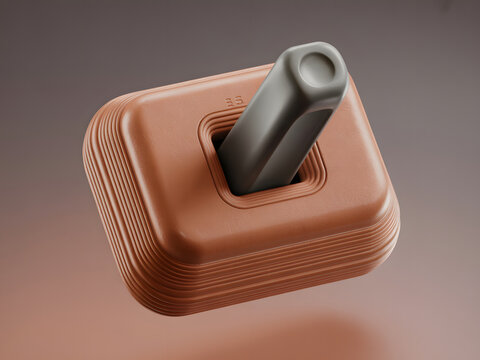 A close-up view of a vintage-style brown and black joystick controller with a metallic finish, standing upright against a gradient background.