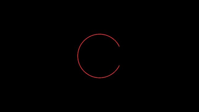 A simple red circle on a black background, a basic geometric shape
