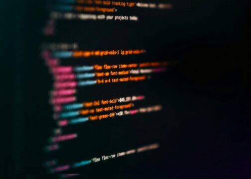 Professional computer screen displaying software code inspiring innovative web programming cyber security data analytics and digital IT technology development commercial banner.