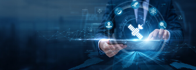 Space Engineer Analysing Space Technology Using Tablet and Networking Data, satellite systems, aerospace innovation, space exploration, advanced engineering © Shevon