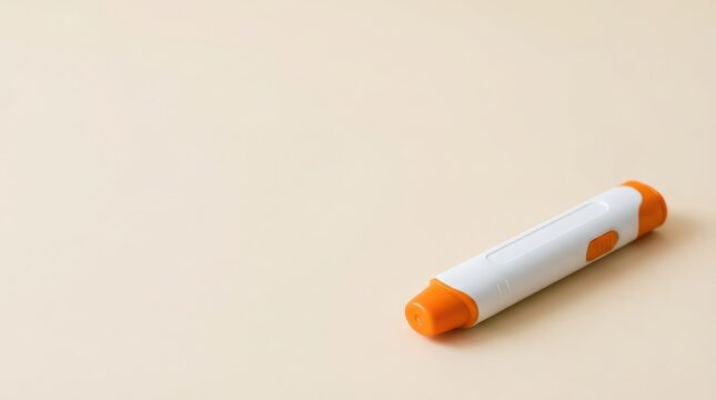 Orange and white epinephrine autoinjector pen on neutral background for food allergy emergency awareness and medical poster or safety design. Copy space