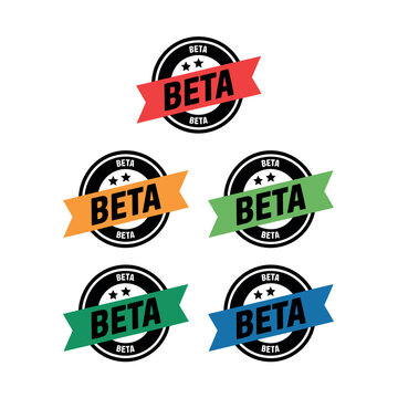 A collection of colorful beta testing labels with black and white circular badges and ribbons in various colors