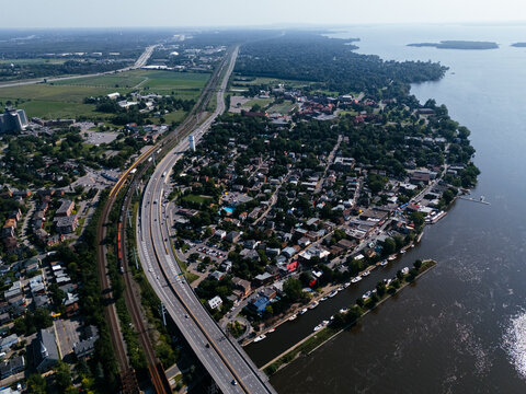 Aerial view toward Montreal from Vaudreuil-Dorion, Quebec, Canada with highway, railway and waterfront. g.