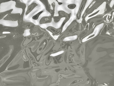 abstract liquid chrome texture with wavy metallic reflections creating a futuristic fluid silver background