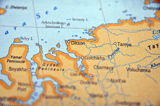 Dikson Settlement Spotted on World Map with Defocused Background
